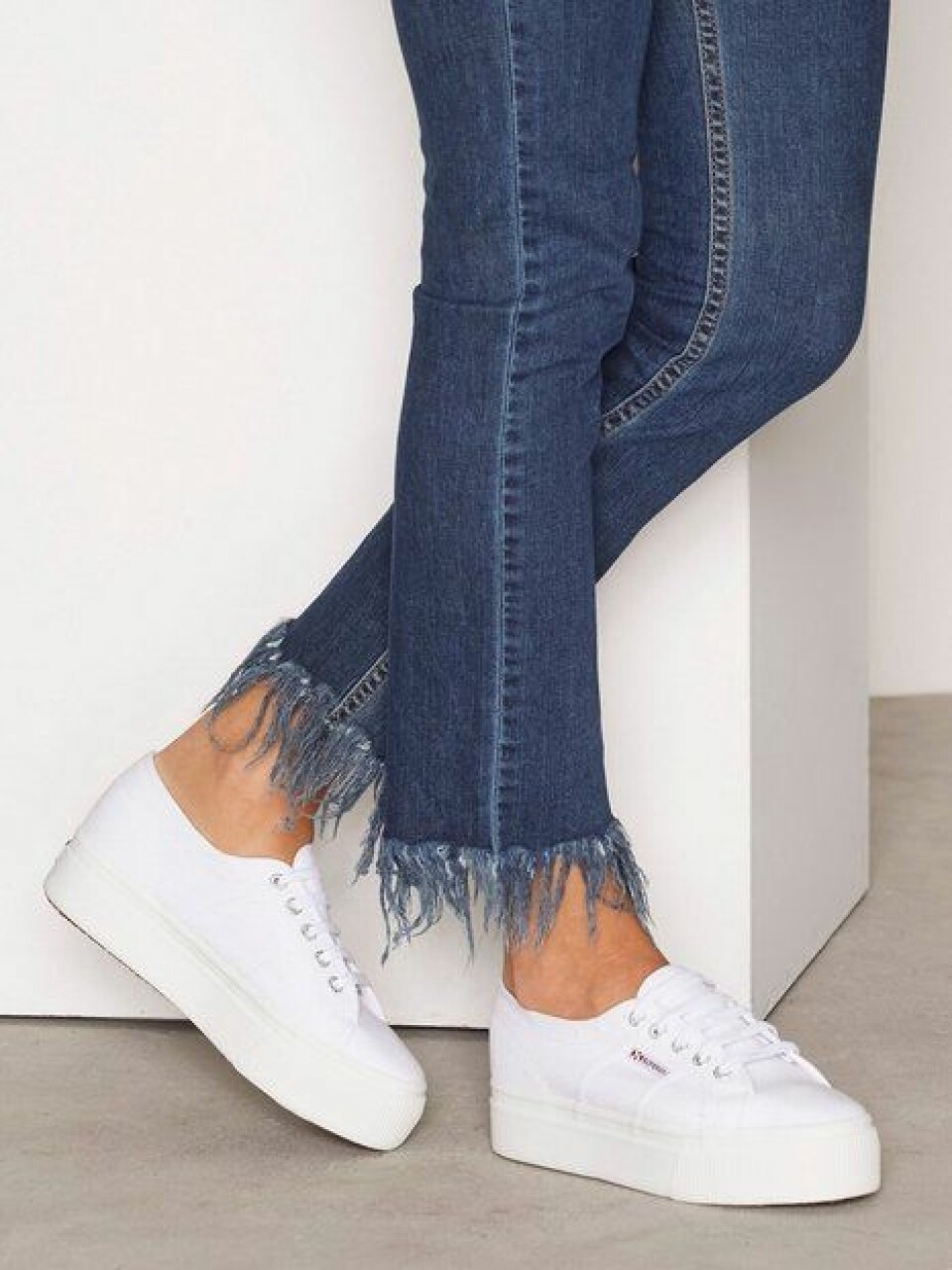 13 par vita sneakers som passar perfekt i vår
